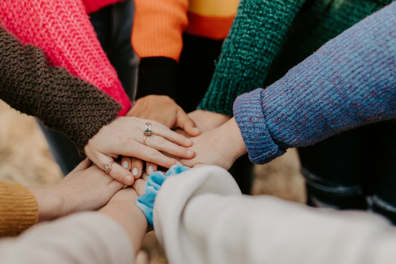 Volunteers helping families set up FallGuard